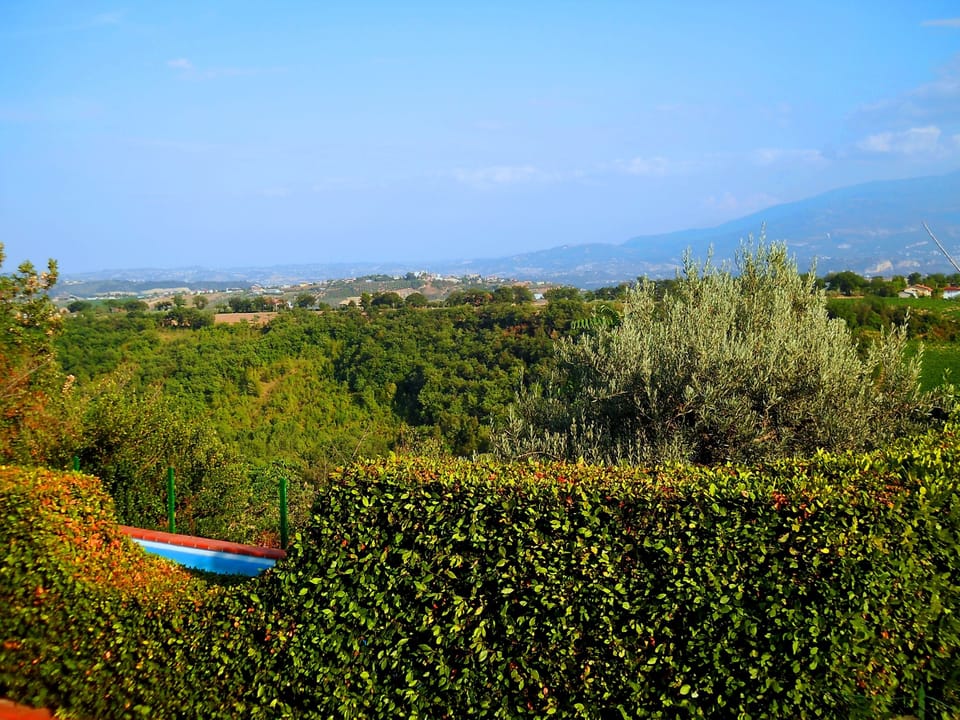 spectacular view from terrace to mountains and pool