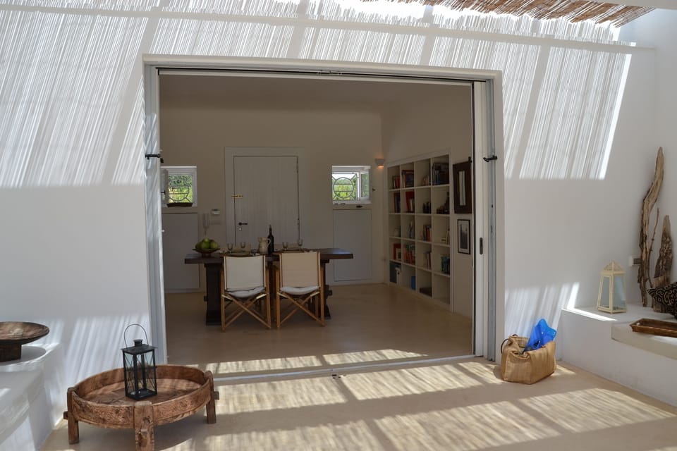 Dining and lounge area seen from the garden