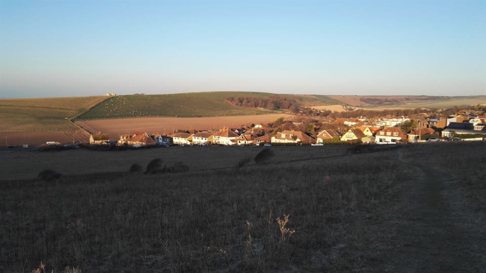 Looking down on Ovingdean village from Beacon Hill