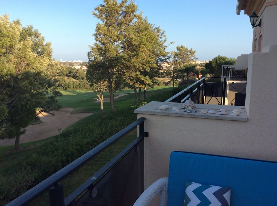 Upstairs balcony with distant sea views