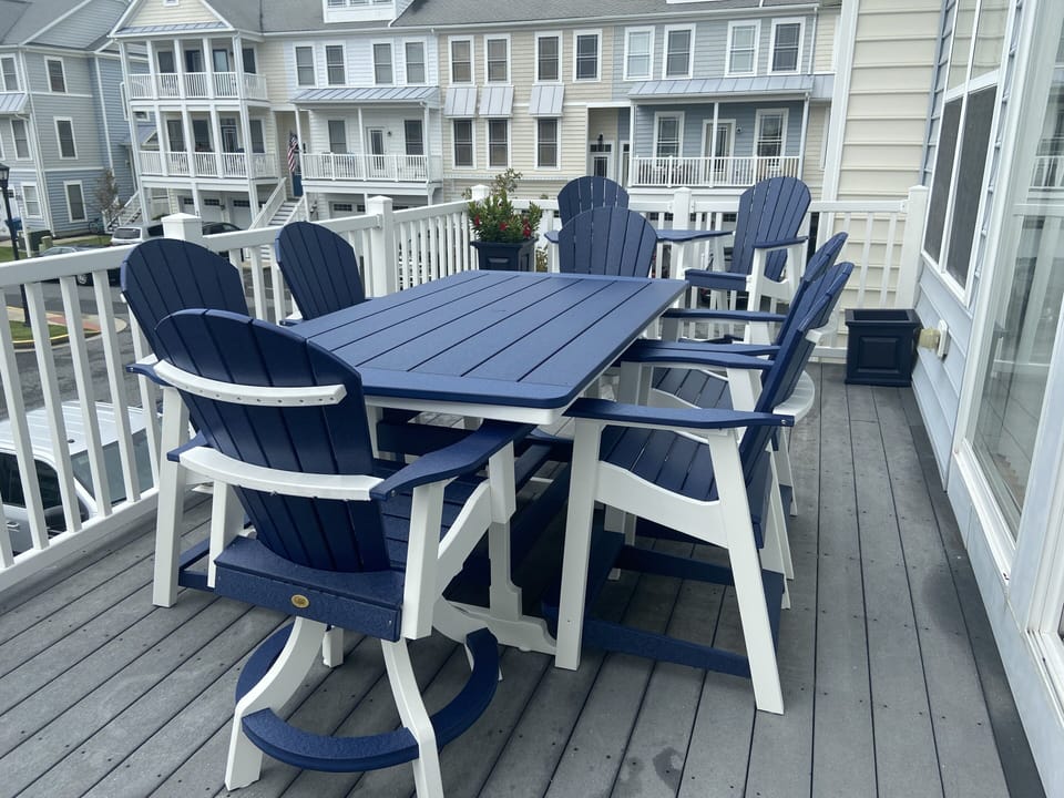 Large back deck with brand new furniture, seating for 8
