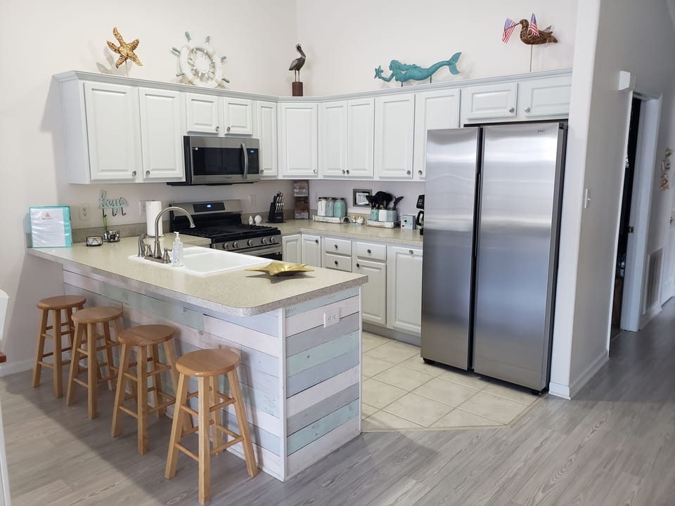 New Appliances / cabinets refinished.