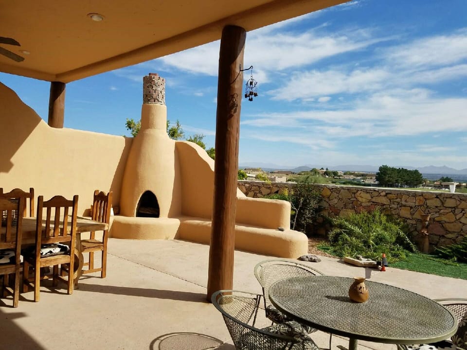 Outside tables and kiva