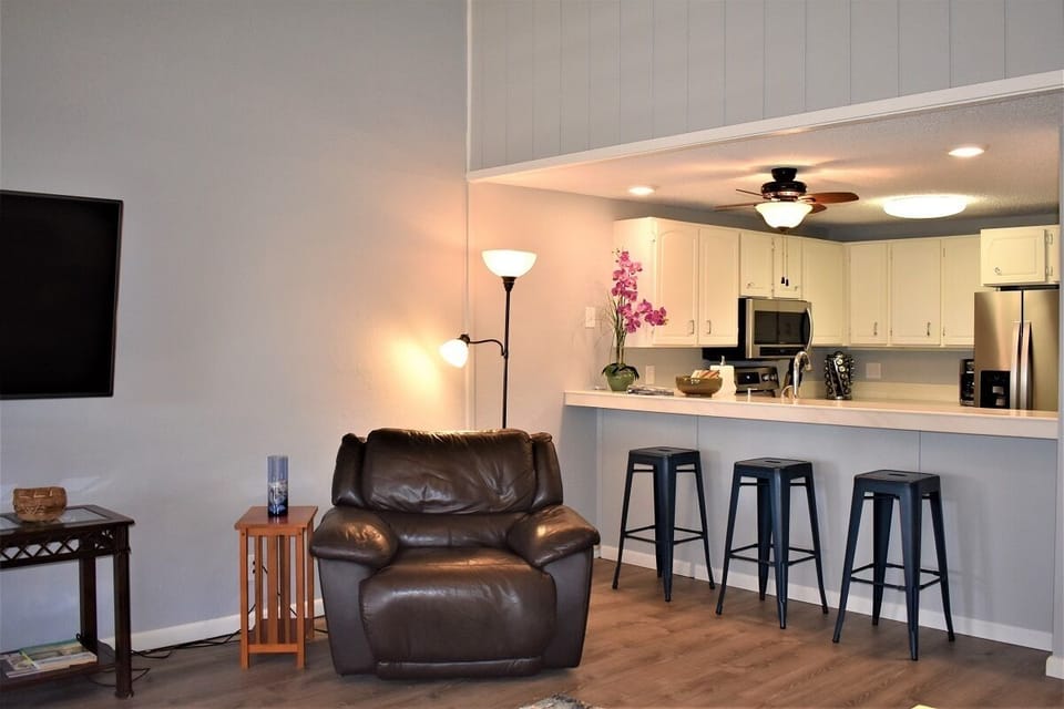 Open floor plan with cathedral ceiling