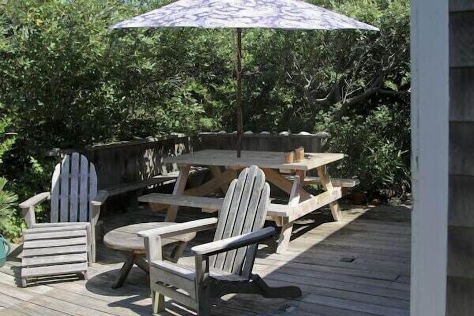 Outdoor patio with picnic tables and chairs