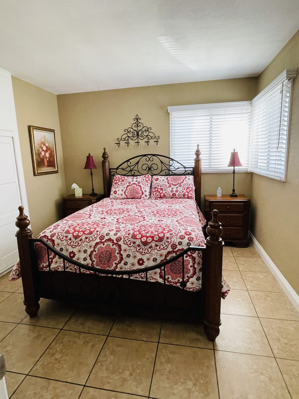 Comfy Queen bed in bedroom.