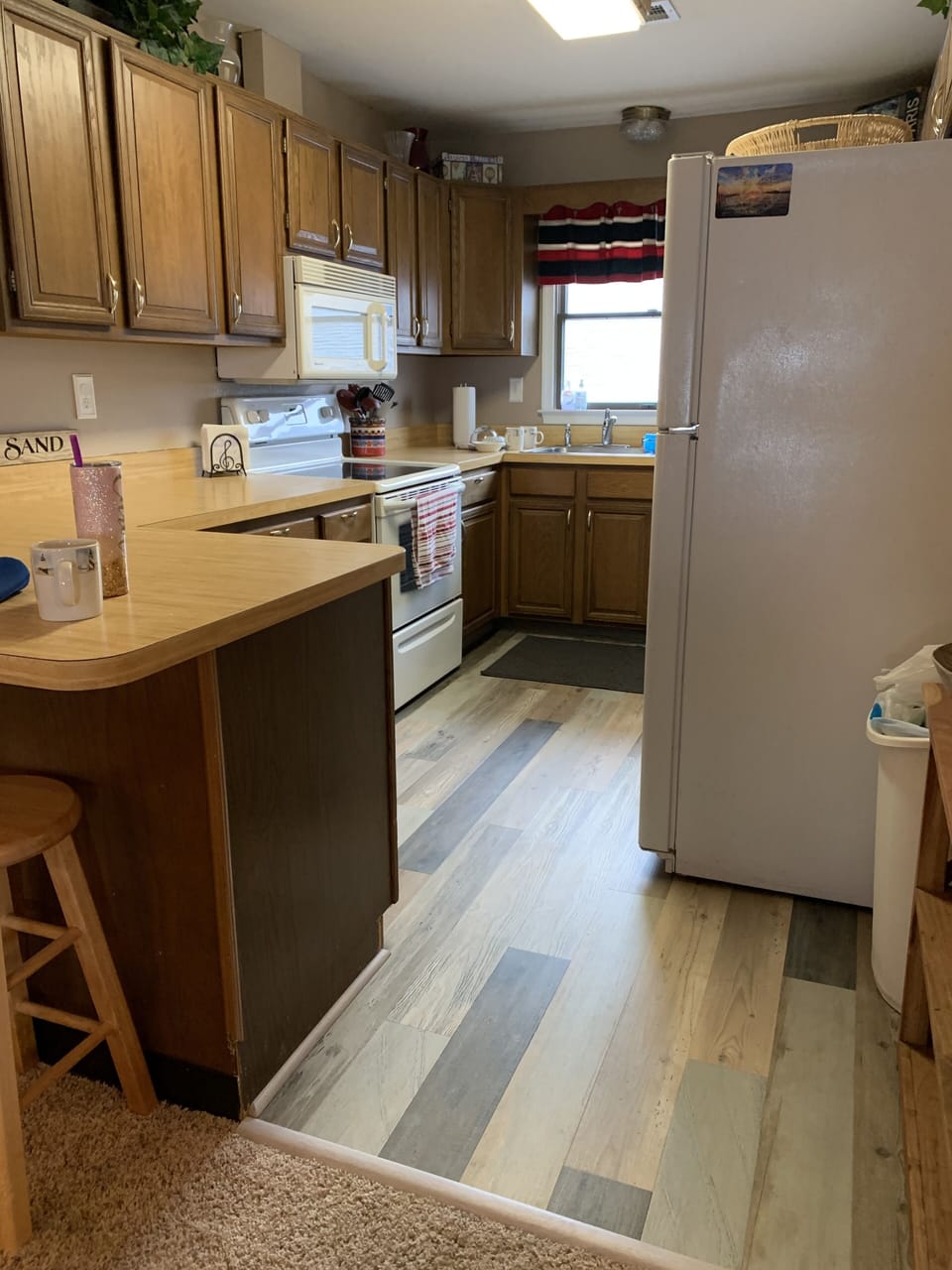 Kitchen with updated floors spring of 2021