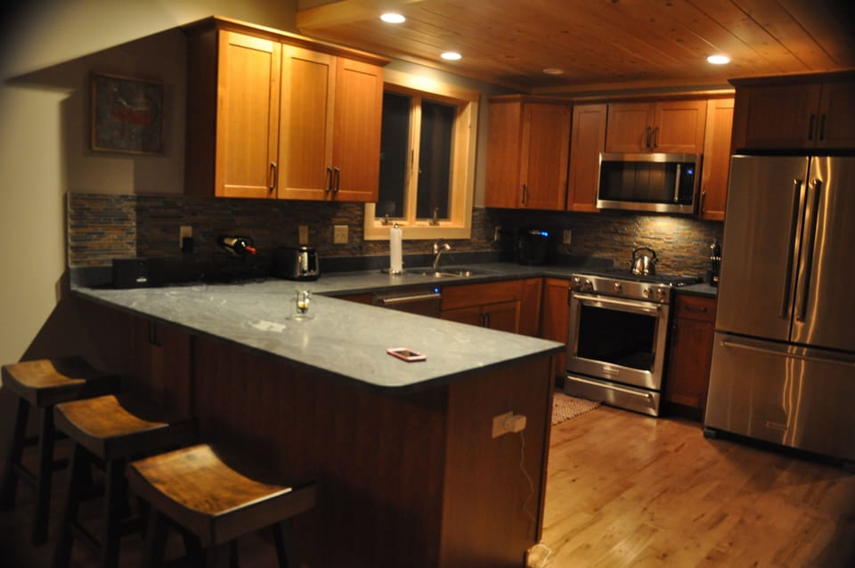 Gourmet kitchen with Kitchenaid  stainless steel appliances, gas stove
