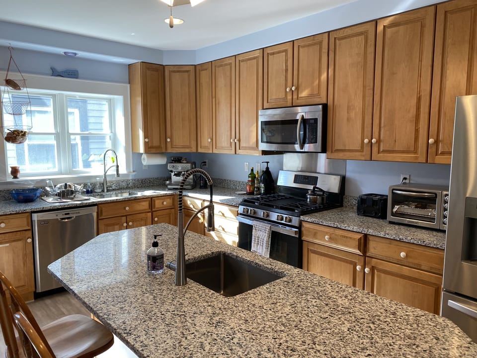 The kitchen is fully equipped with new appliances