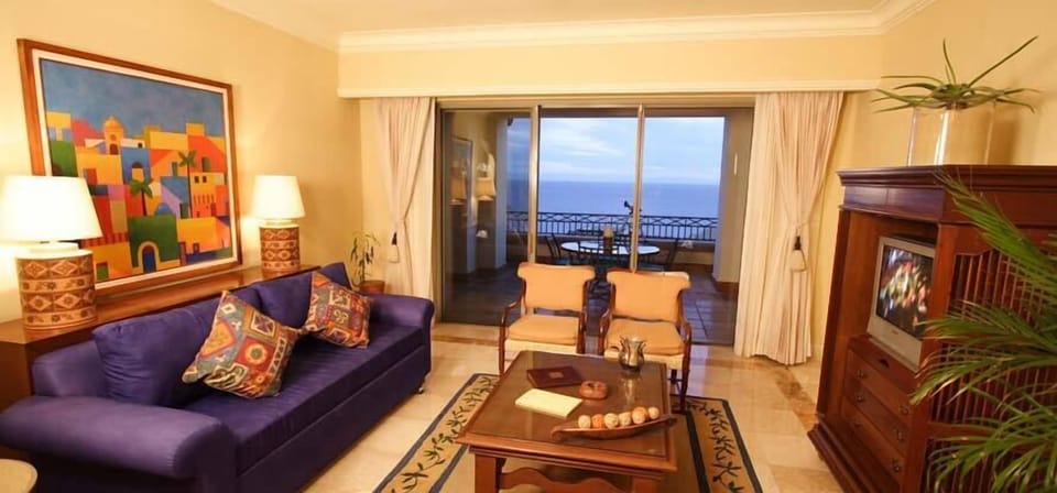 Tastefully appointed, spacious living room w/ separate terrace/balcony entrances