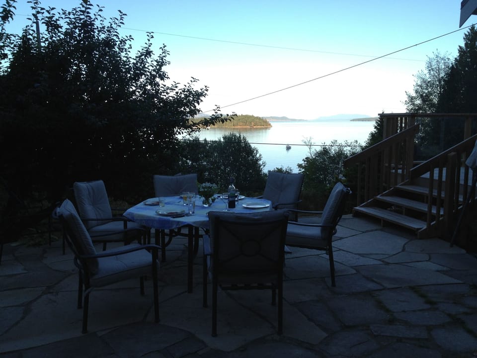Dinner on the stone patio as the sun sets.
