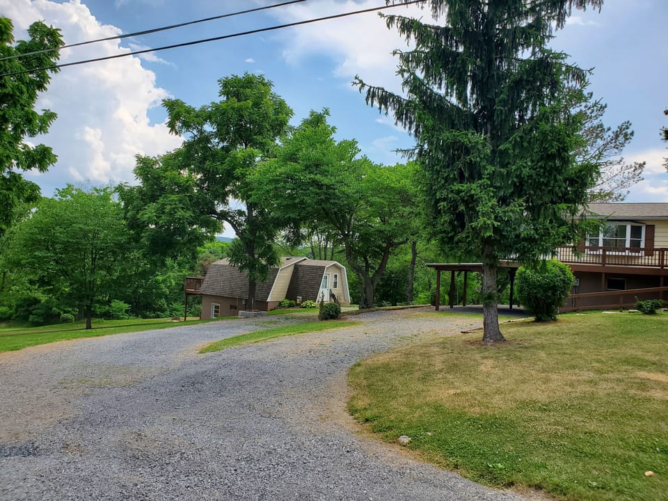 The cottage sits across the driveway from our other vacation rental.