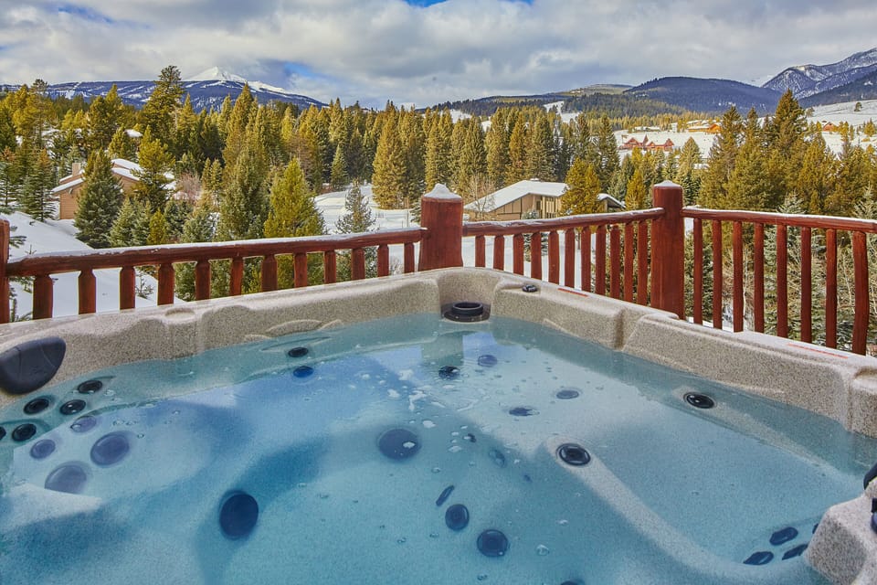 New six person hot tub with breathtaking views of the Mountains.