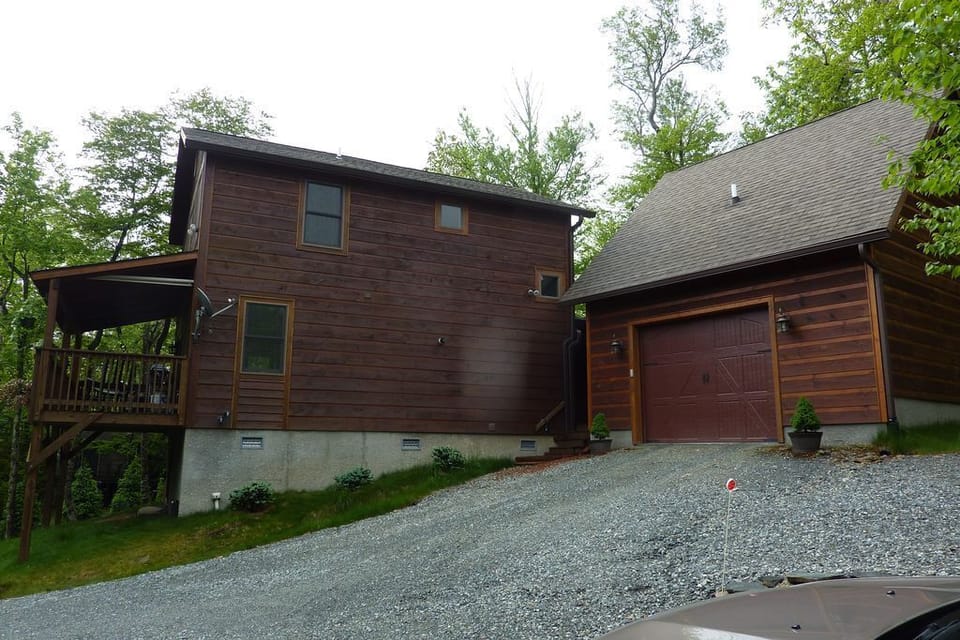 Side of house and garage.