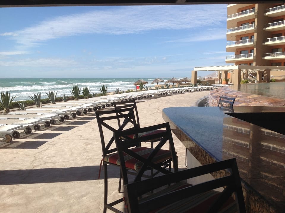 Pool bar area down at the beach.  Grab a drink and something to eat.