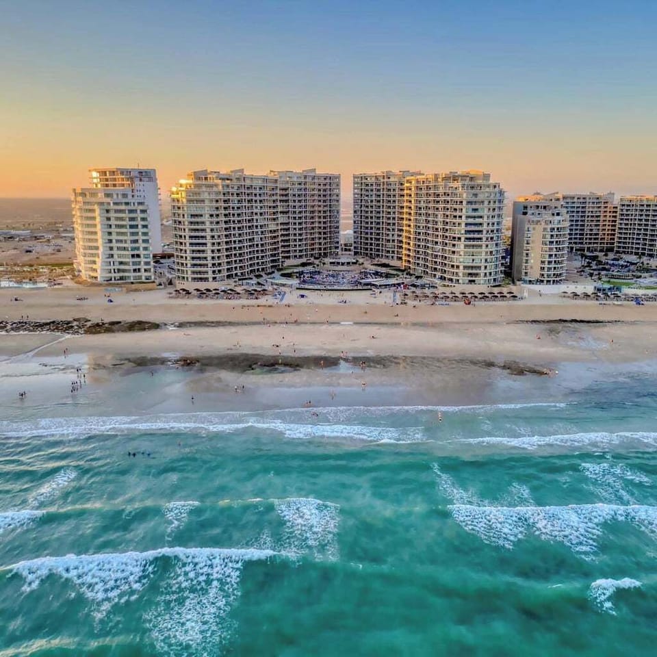 View from the air of the resort.  Tide is out and beach is wide for walking!