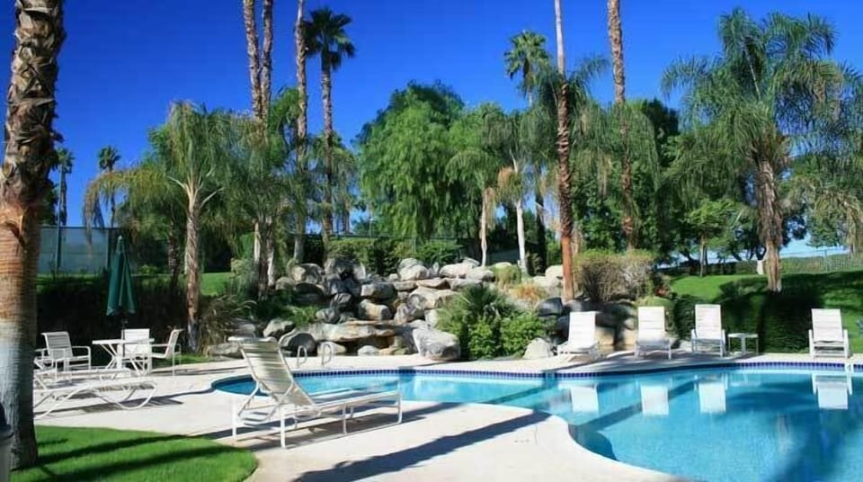 one of the six heated pools and spas. Closest pool is right behind our garage.