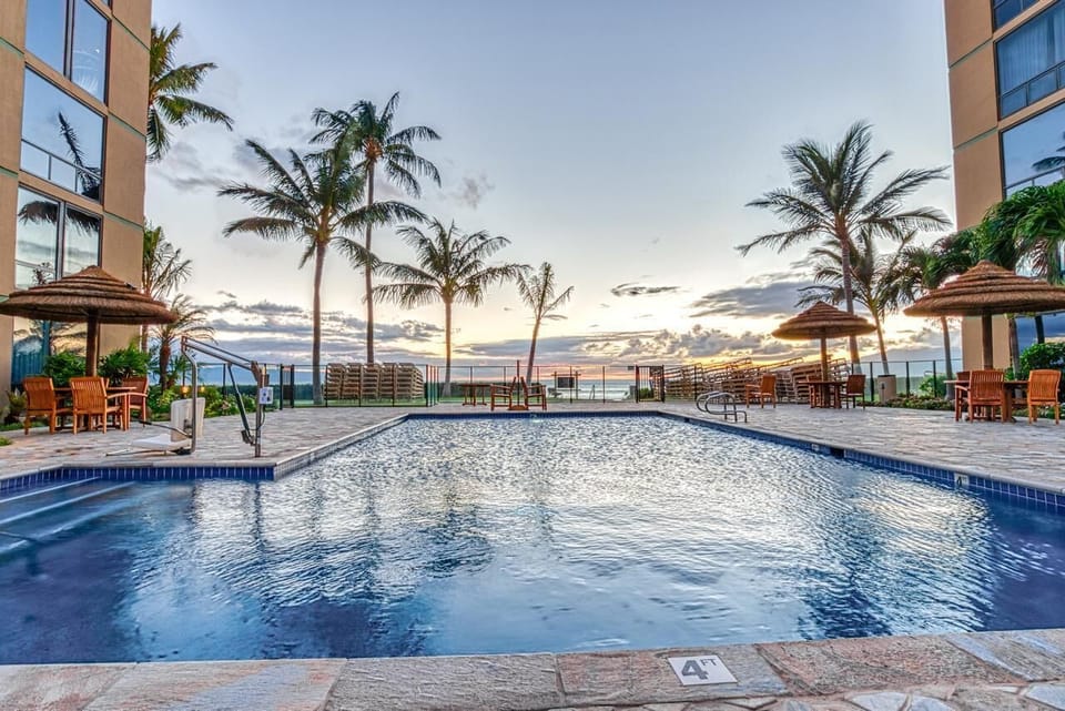 Pool and poolside cabanas.