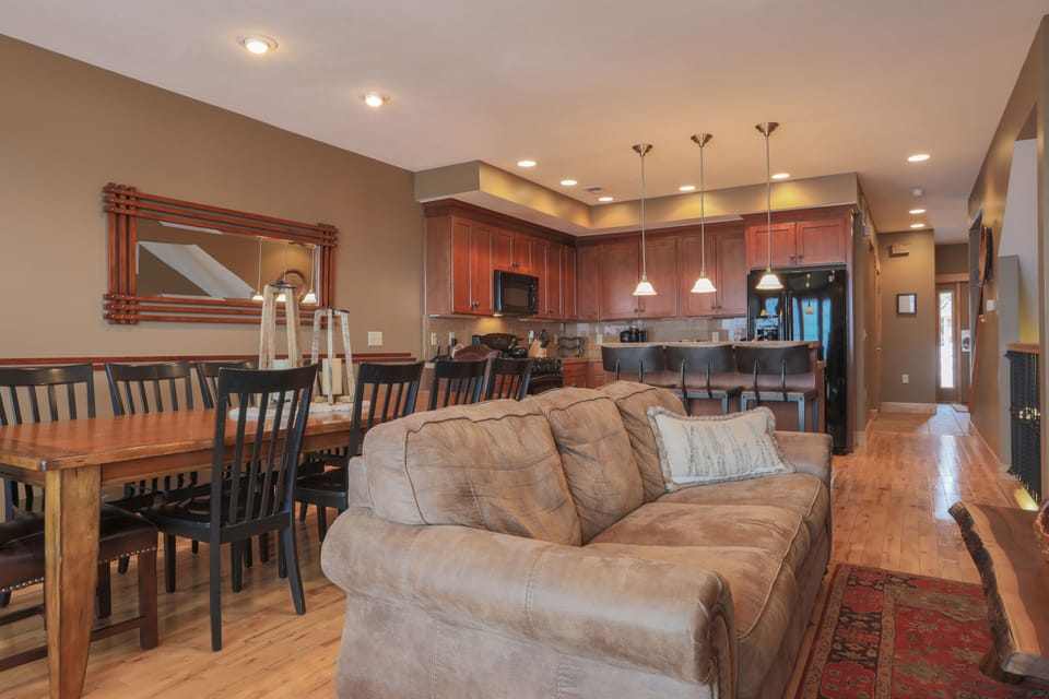 Spacious dining and kitchen area with comfortable seating for 13. 