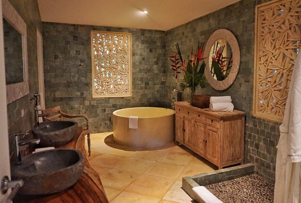Enjoy the master bath with large stone tub. 