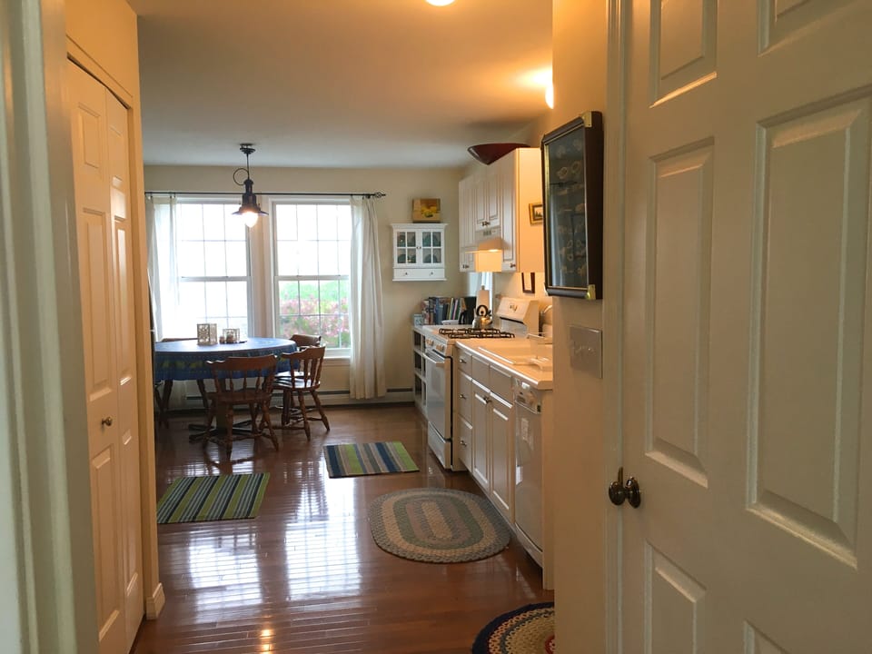 View from downstairs hallway into kitchen.