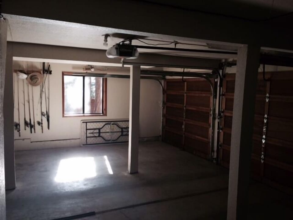 Park your vehicles out of the elements in the two car garage.