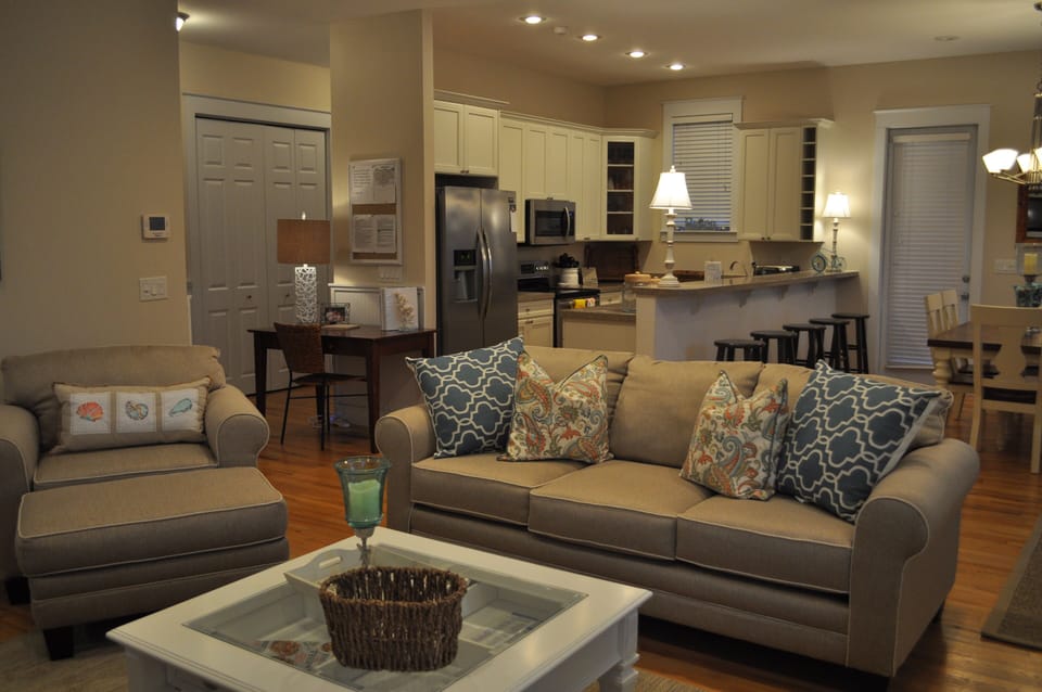 View of Living space & Kitchen. Closet left corner of pic houses washer/dryer