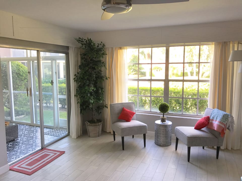 Window sitting area and sliders to lanai