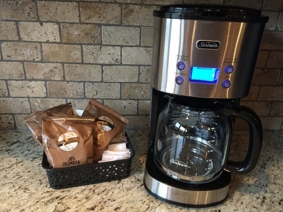 Coffee, sugar, sweet & low, and whitener provided.