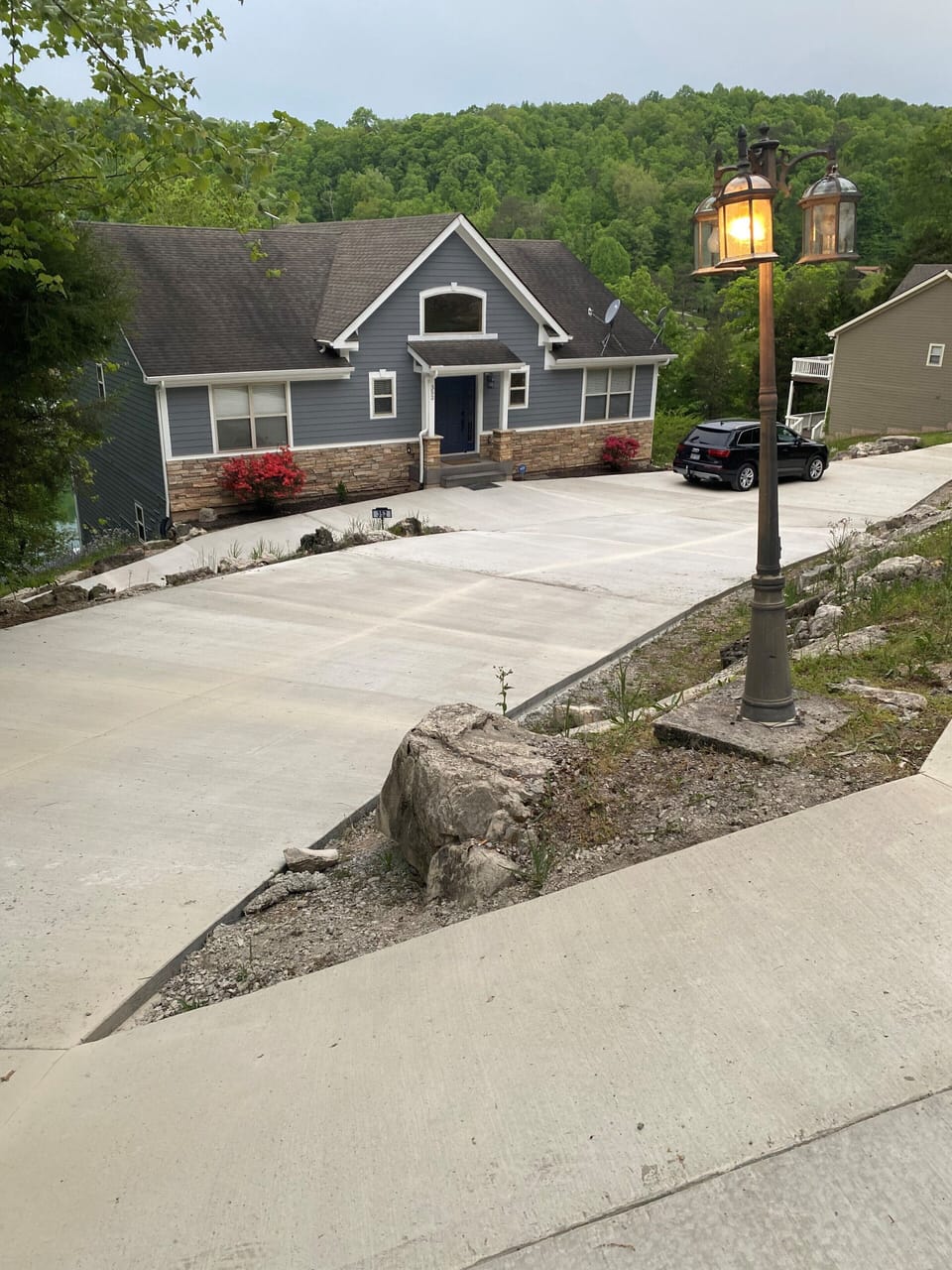 Front of house with new driveway