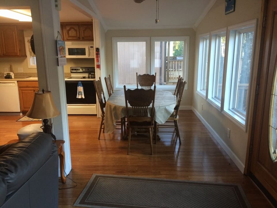 VIEW FROM LUV SEAT LOOKING TO DINNING AREA  