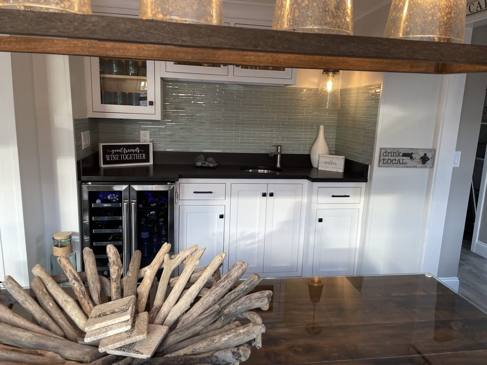 wet bar with beverage fridge