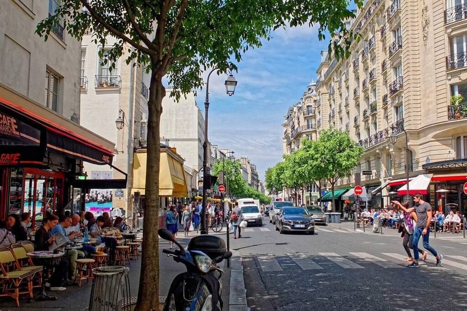 Just steps away from Rue de Bretagne, a lively street with local Paris flavor.