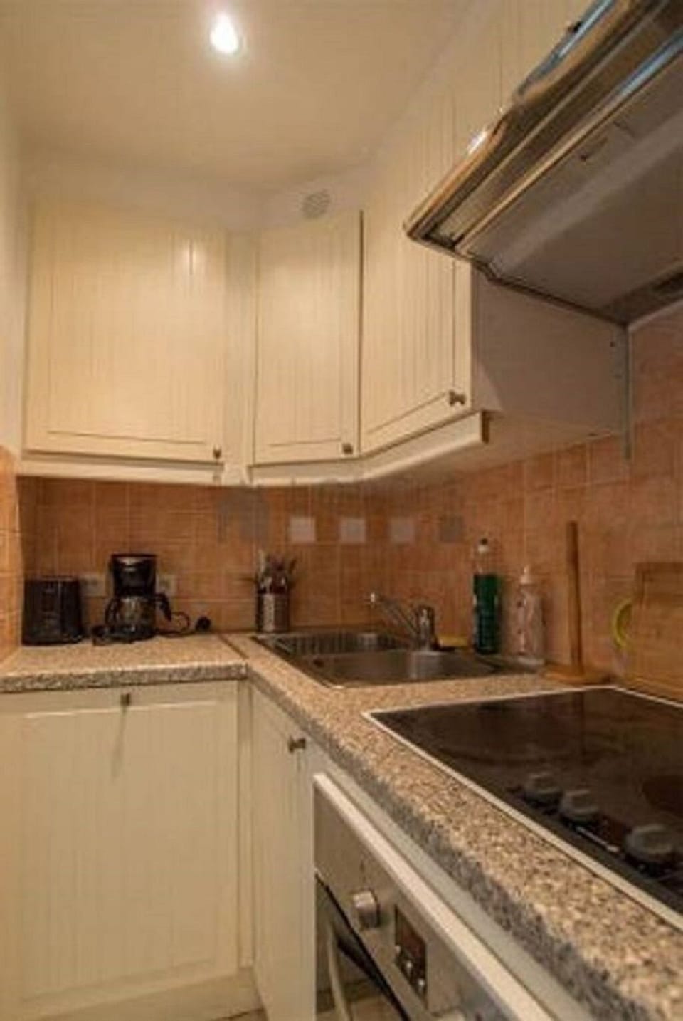 Kitchen cabinets fully stocked. .Coffee maker, toaster, microwave.
