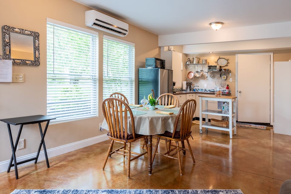 Dining area overlooking garden and koi fish pond