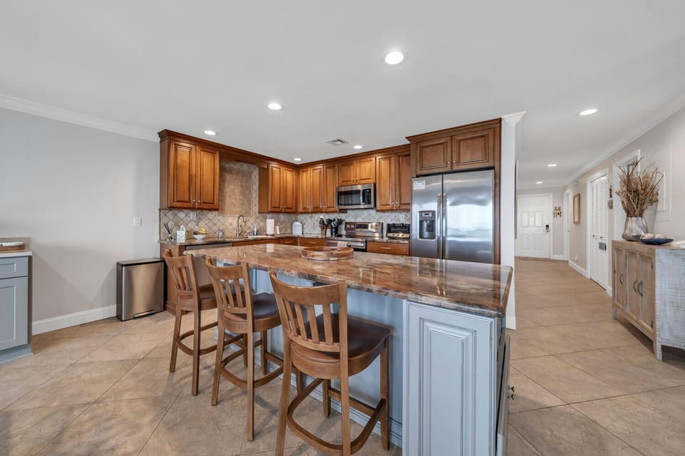 Kitchen area with bar stools