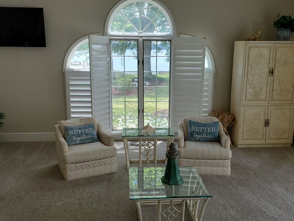 downstairs king master suite with 55 inch TV