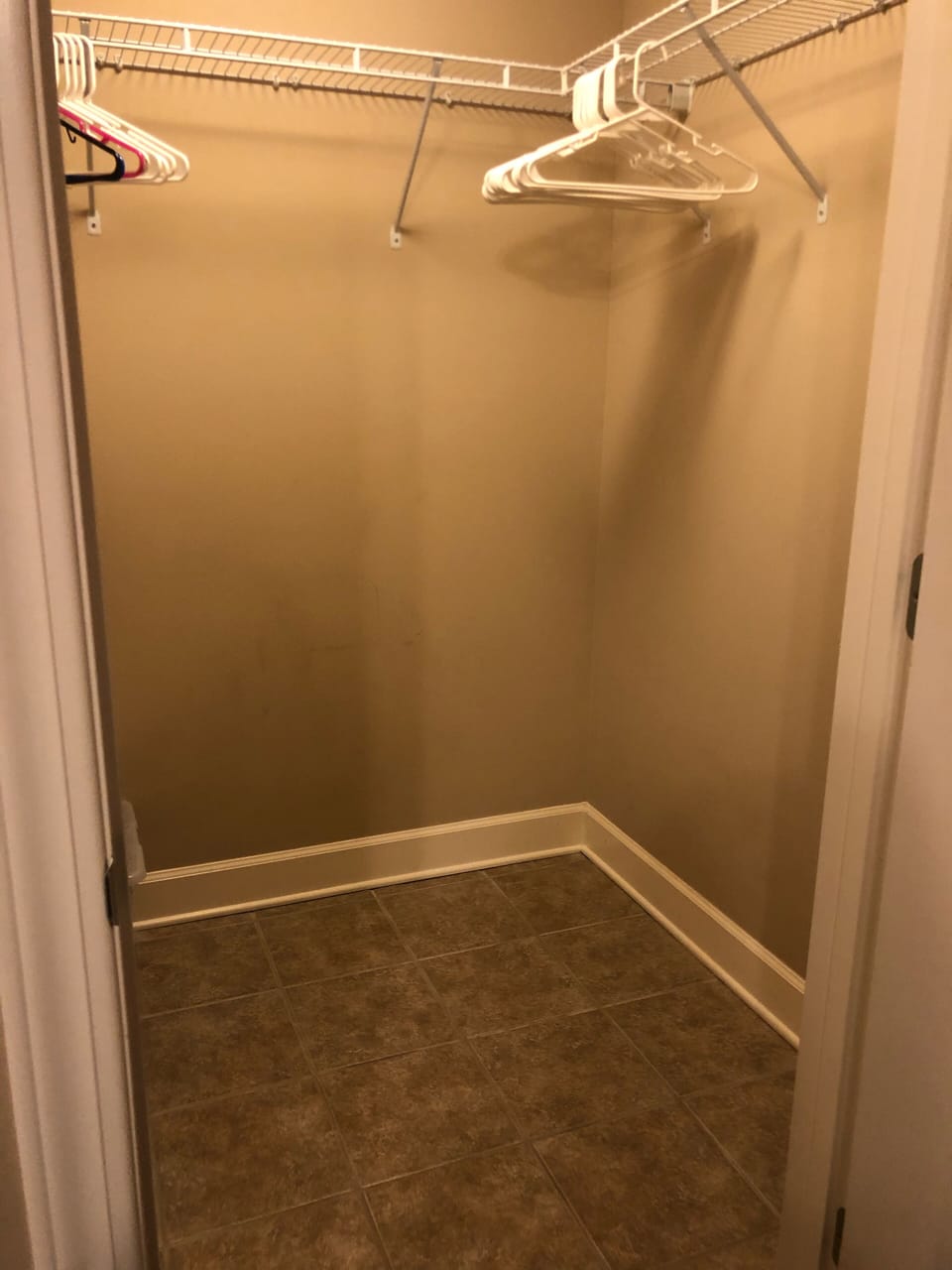 Large walk-in closet with plenty of storage. Large enough for pack n play crib