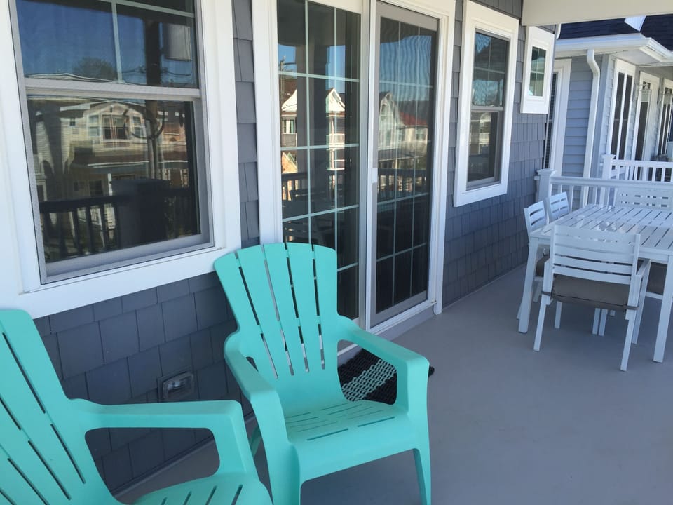 Front Deck with Full Dining and Seating Areas