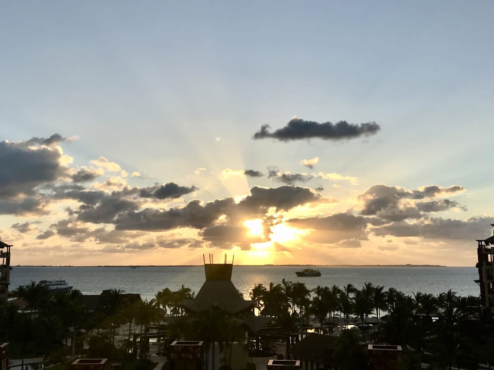 saluting the sun from the balcony of one of the rooms