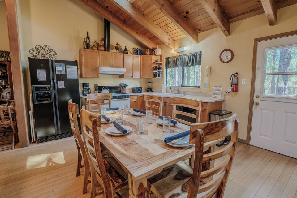 Enjoy family dinners or group meals in the inviting dining room, designed to complement the open layout.