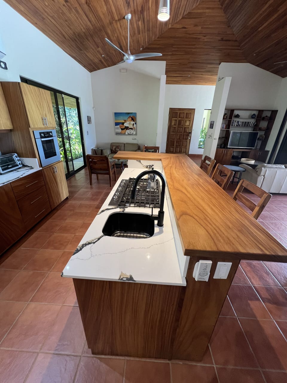 Updated kitchen Island - guanacaste wood bar top.