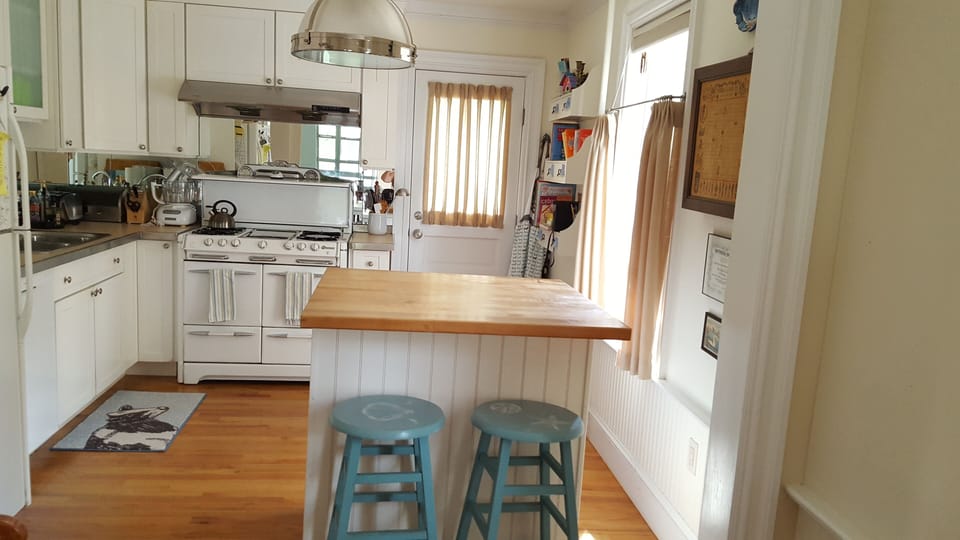 Fully equipped, bright kitchen.  Island with extra prep space.