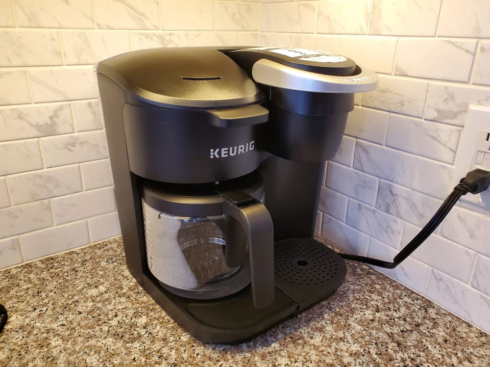 New Keurig for both single-cup pods and 12 cup pots replaced the other coffee makers shown in the pics