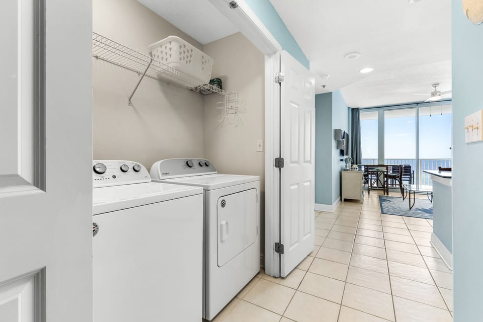 Laundry area with full sizer washer and dryer
