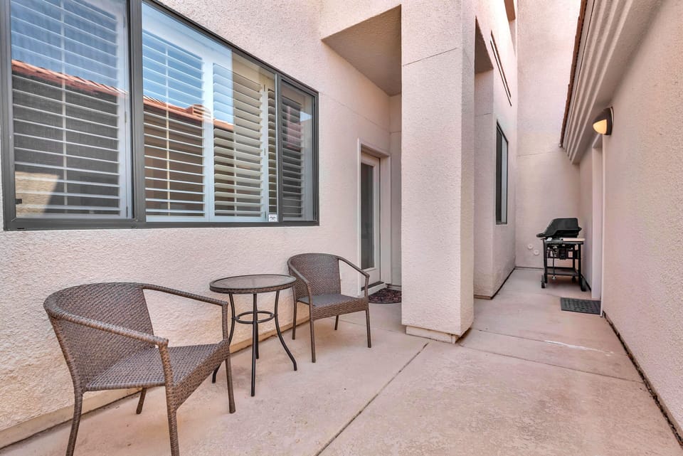 Private courtyard connects condo and garage