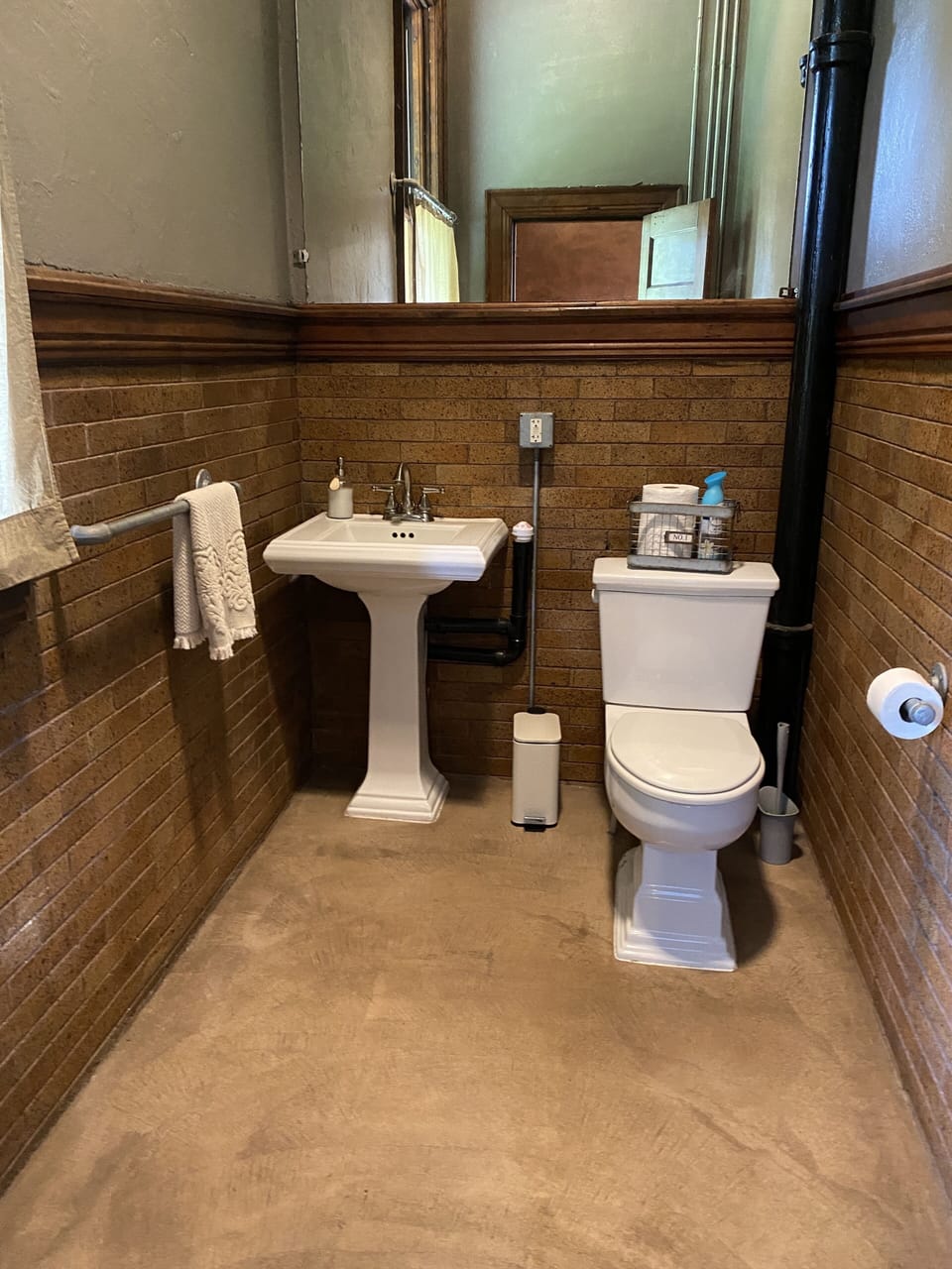 bathroom off of the dining area which is one of three bathrooms 