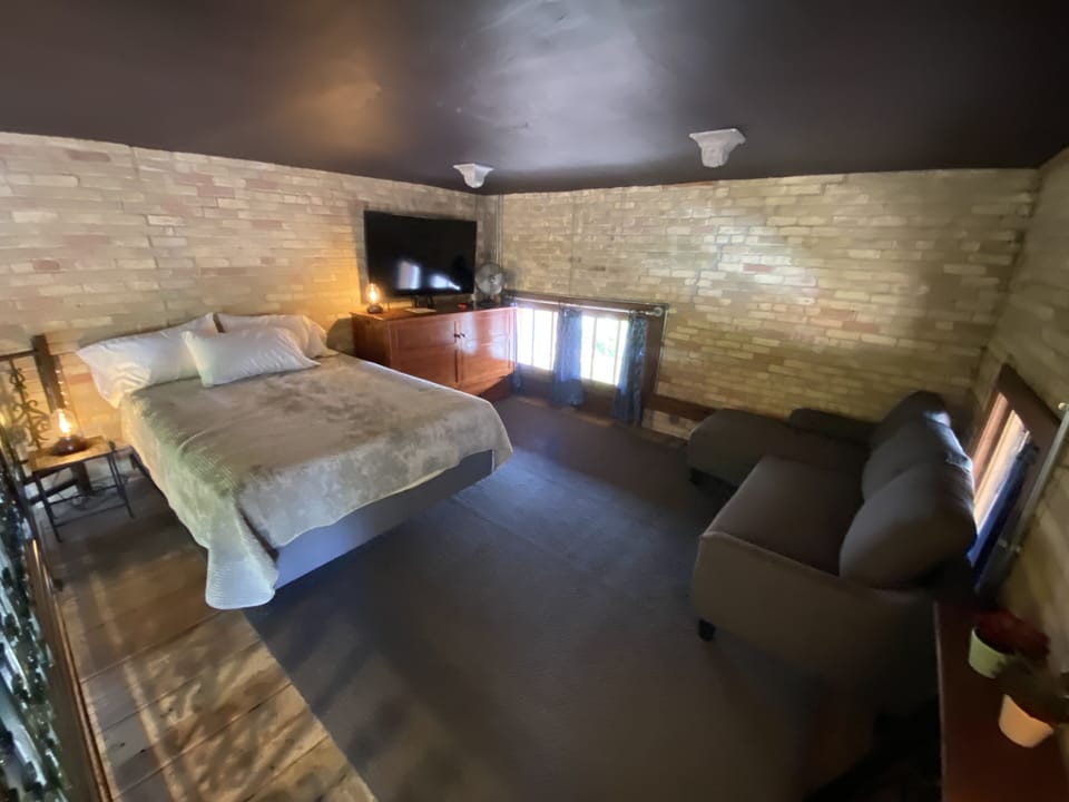 The loft has a queen bed, queen Murphy bed cabinet & sofa with pull out