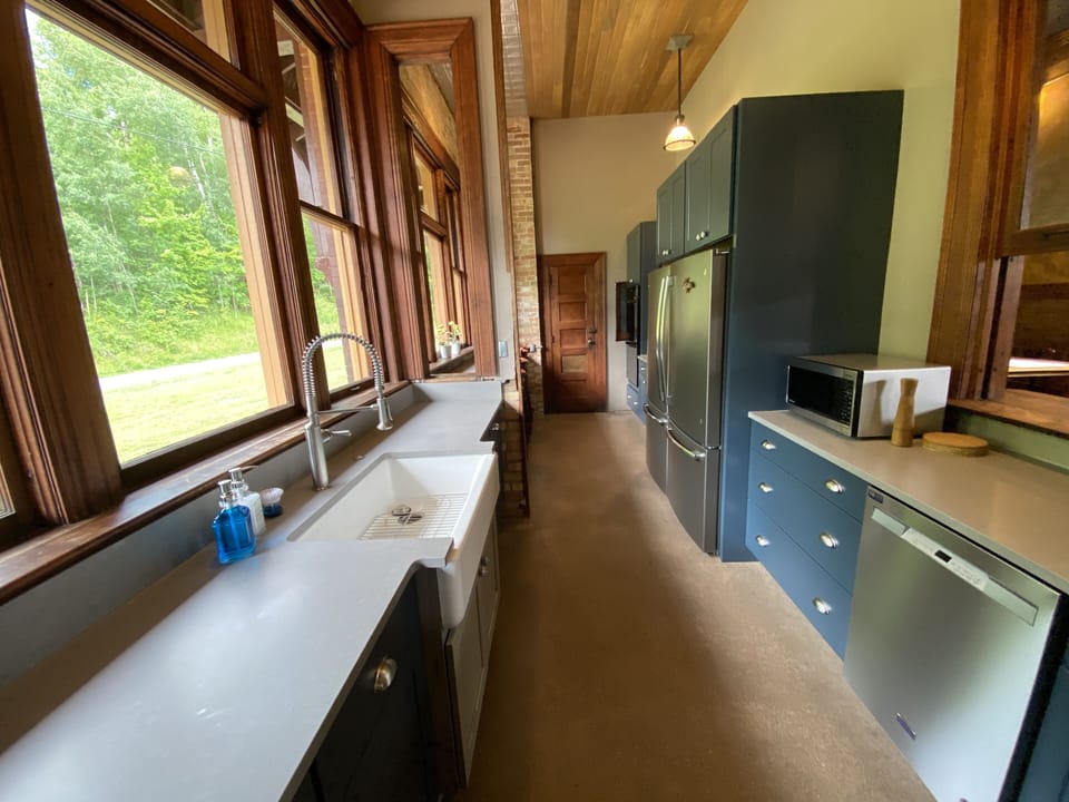 Newly renovated kitchen is a cook or caterers dream with farm house sink 