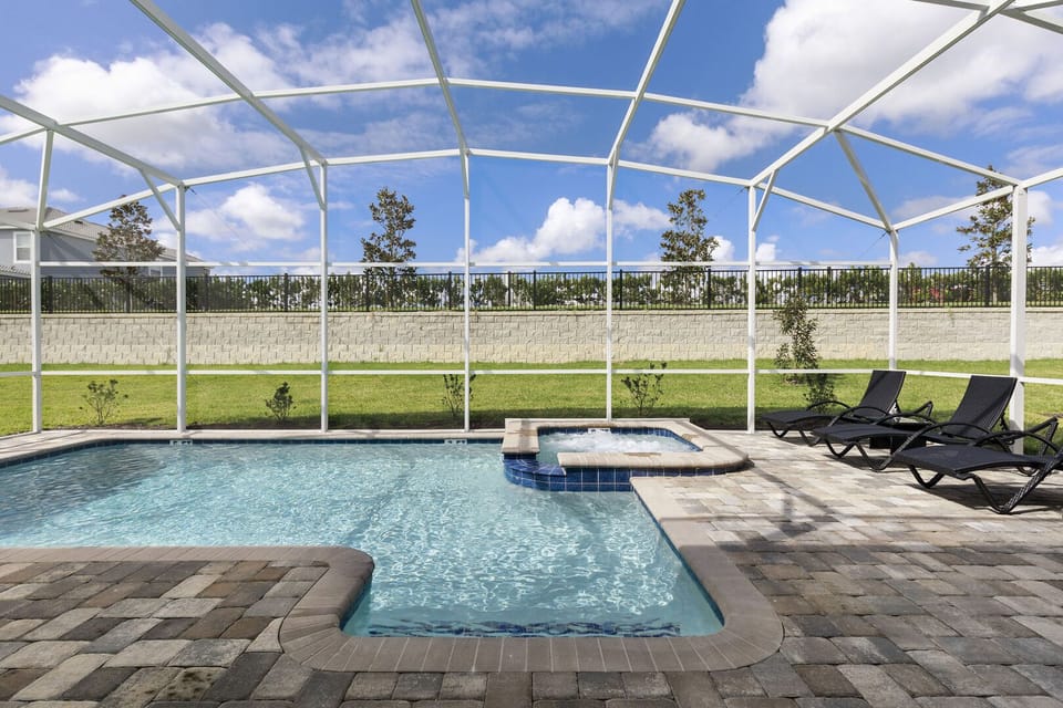 private pool with chair at The Retreat at ChampionsGate